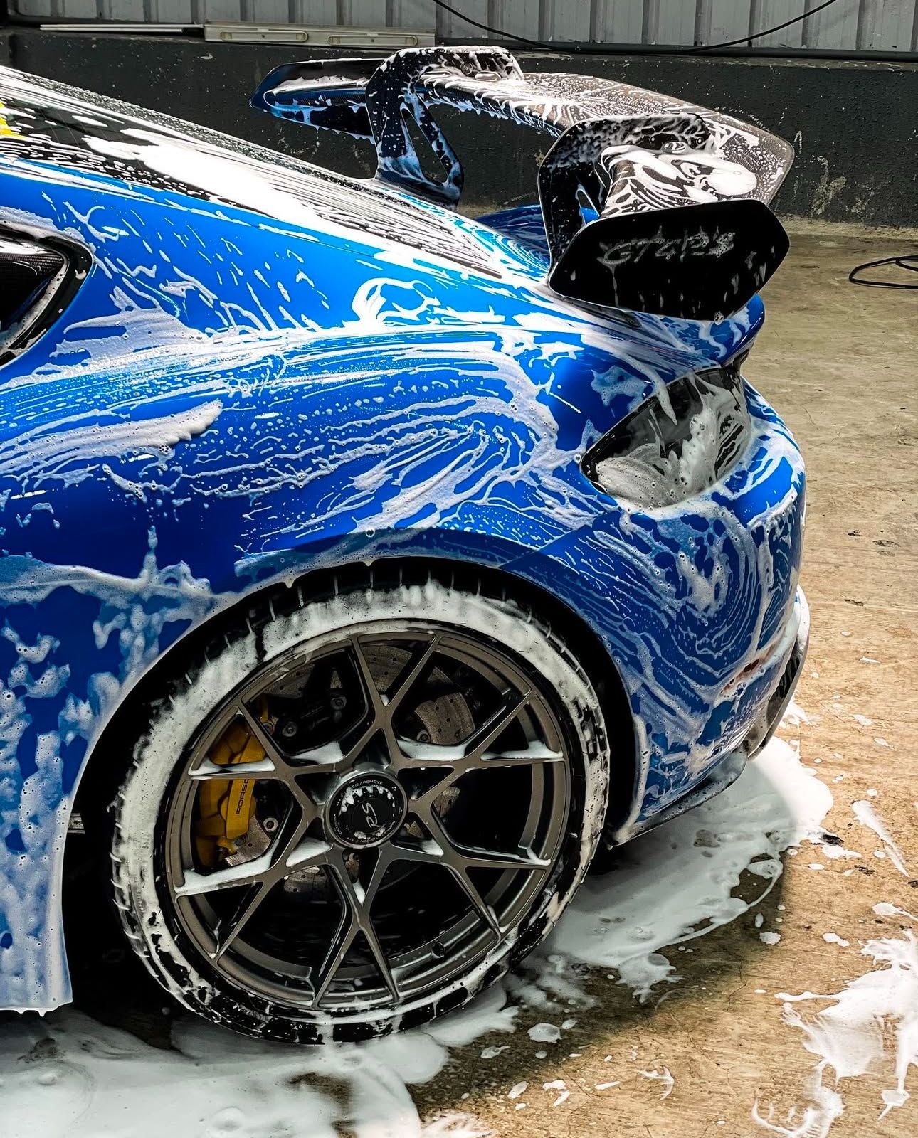 Vehicle being hand washed with professional soap 