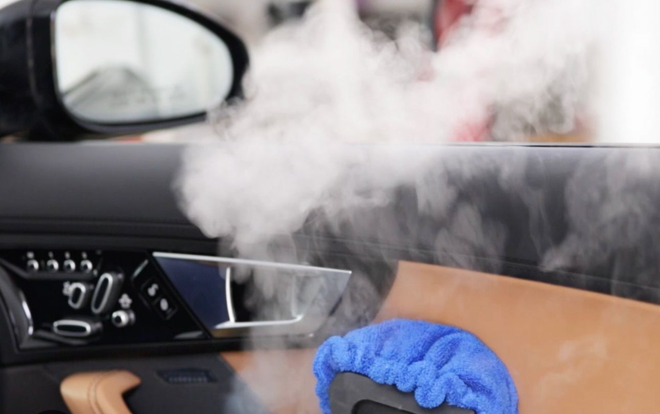 steam cleaning vehicle doors